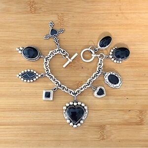 $738  Vintage Old Mexico Multi Charm Bracelet  Sterling Silver & Onyx